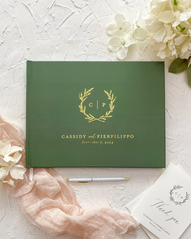 Green guestbook with olive branches for Italian wedding
